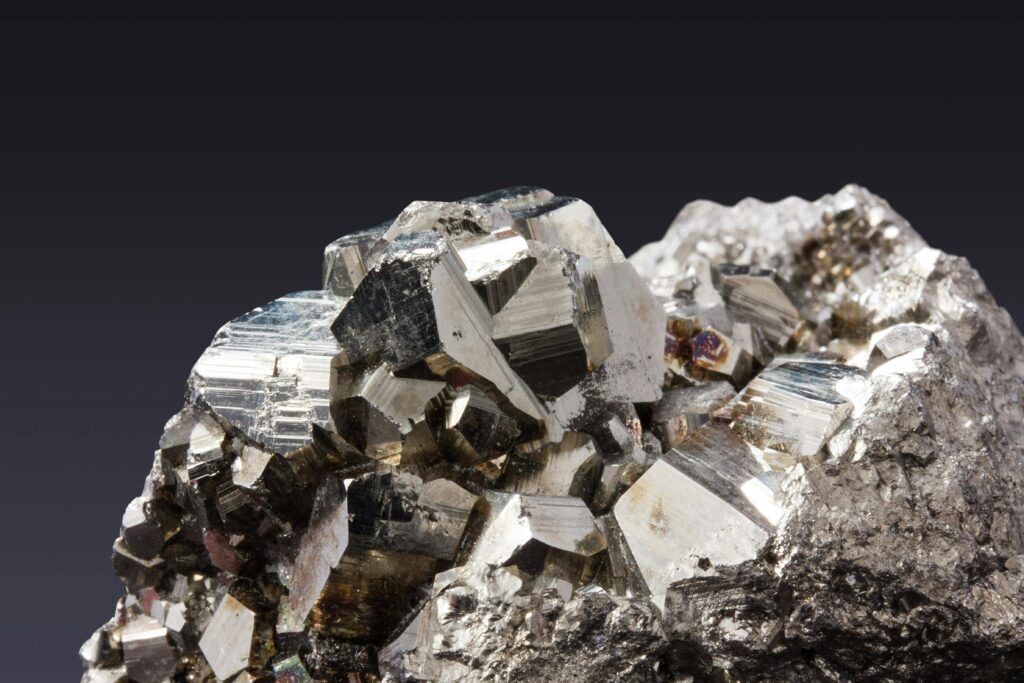 Close-up image of sparkling pyrite crystals showcasing their metallic luster.